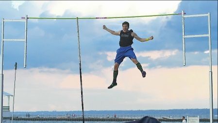 Photo of pole vaulter in the air